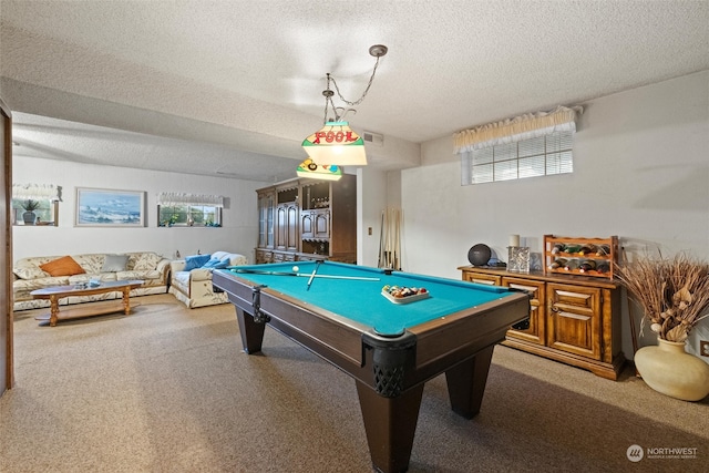 rec room with carpet, a textured ceiling, and pool table
