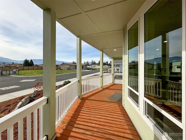 balcony featuring a mountain view