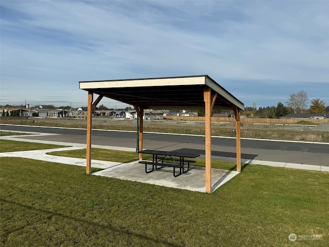 view of home's community with a gazebo and a yard