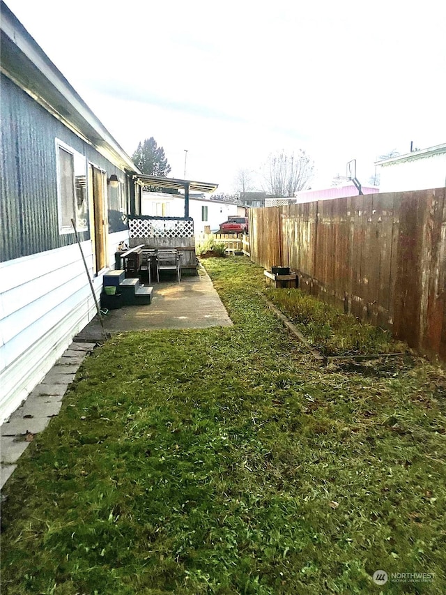 view of yard with a patio area