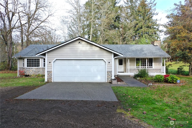 ranch-style home with a porch, a front lawn, and a garage