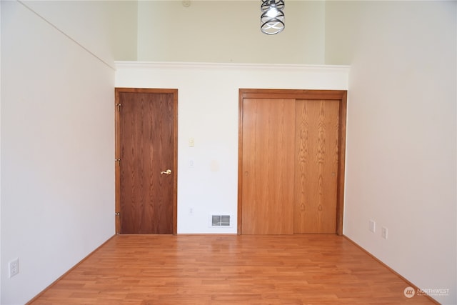 unfurnished bedroom featuring light hardwood / wood-style floors