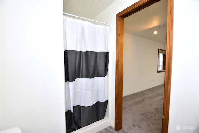 bathroom featuring walk in shower