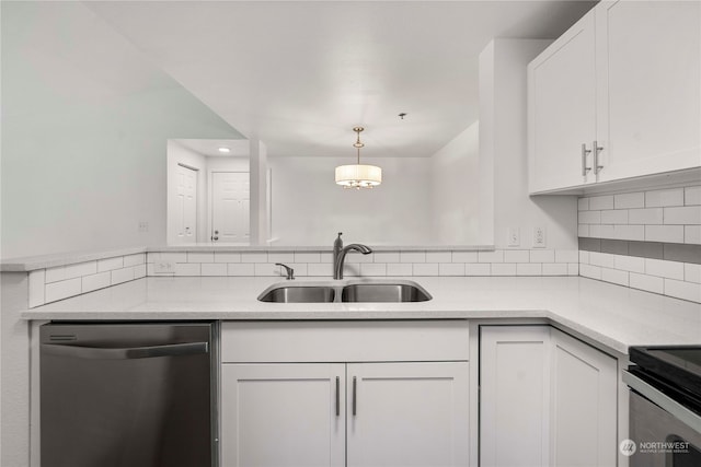 kitchen featuring white cabinets, sink, hanging light fixtures, stainless steel dishwasher, and tasteful backsplash