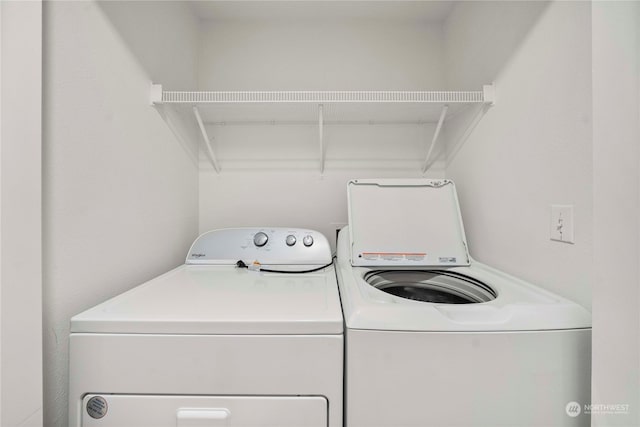 laundry room with independent washer and dryer