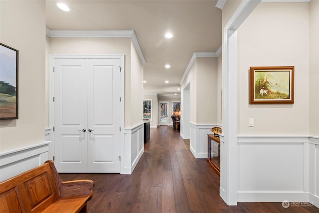 28330 318th Dr SE, Ravensdale, WA 98051 - hallway with crown molding, wainscoting, dark wood-type flooring, recessed lighting, and a decorative wall