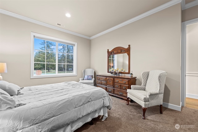 bedroom featuring crown molding and carpet floors