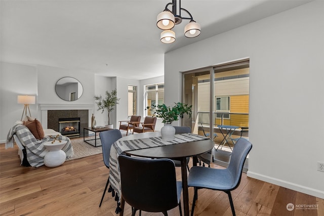 dining space with light wood-type flooring