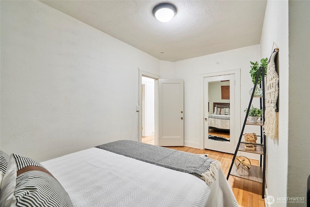 905 NE 43rd St Unit 108, Seattle, WA 98105 - bedroom featuring light wood-style floors