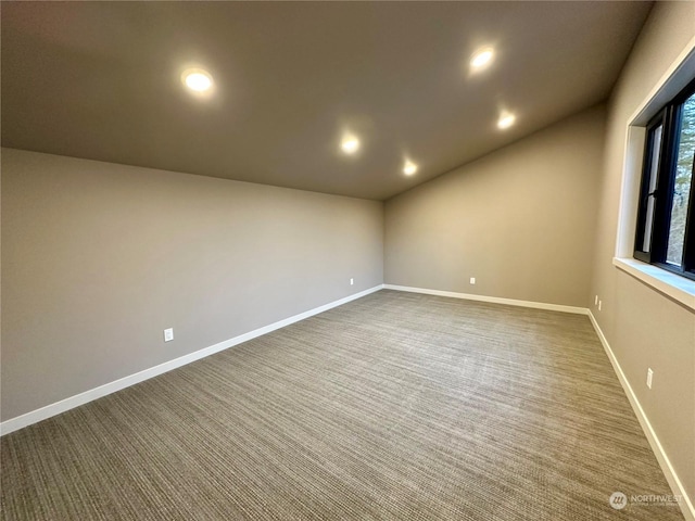 4286 Creston Way, Bellingham, WA 98226 - spare room featuring dark colored carpet, recessed lighting, and lofted ceiling