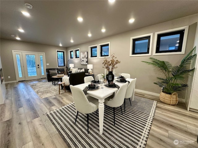 dining room with light hardwood / wood-style flooring