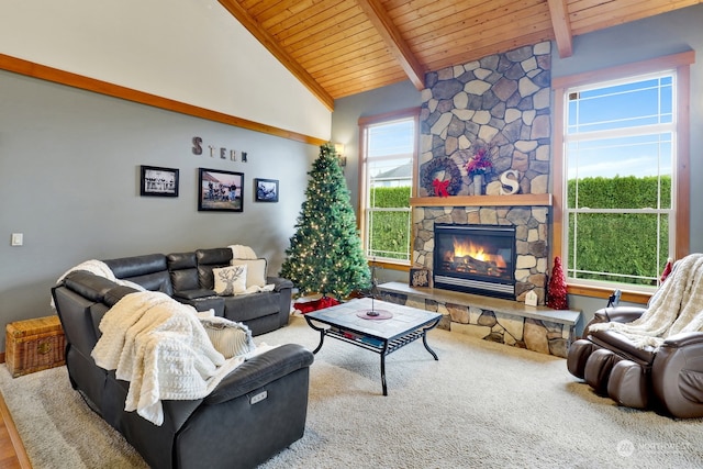 living room featuring a stone fireplace, beamed ceiling, high vaulted ceiling, carpet floors, and wood ceiling