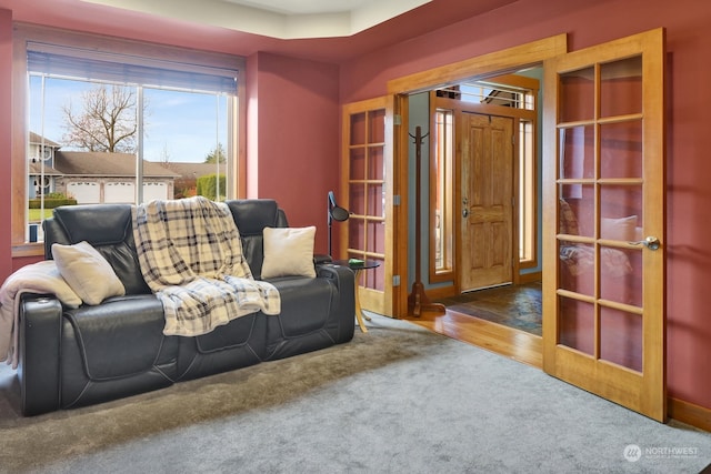 sitting room featuring dark wood-type flooring