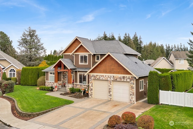 craftsman-style house with a front lawn