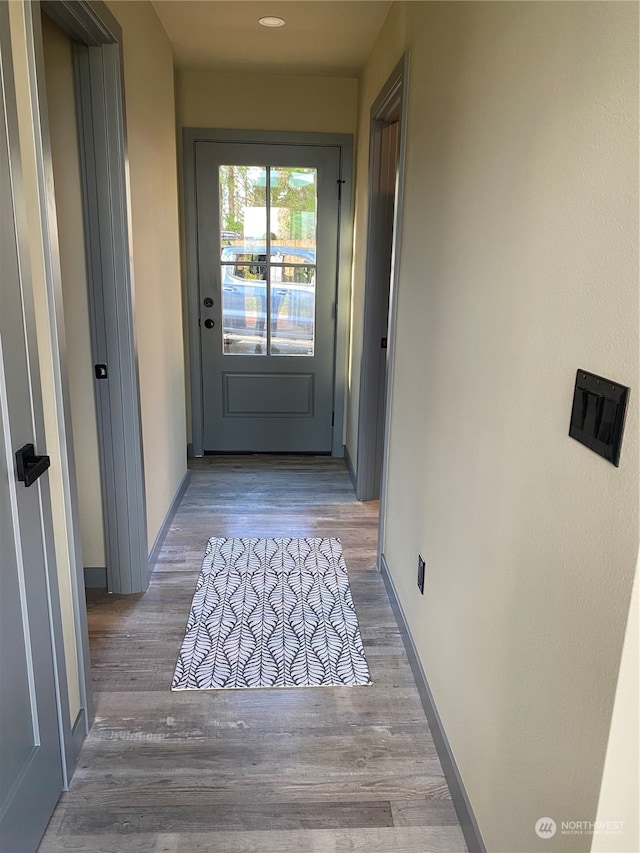 doorway featuring hardwood / wood-style flooring