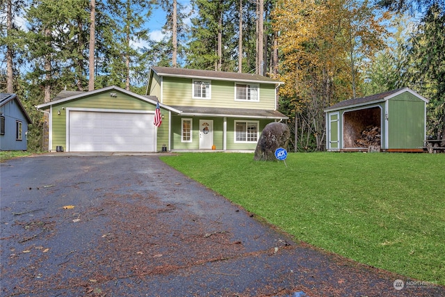 front facade featuring a porch, a garage, and a front lawn