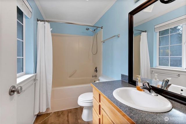 22222 Bluewater Dr SE, Yelm, WA 98597 - bathroom featuring toilet, shower / bath combo, ornamental molding, vanity, and wood finished floors