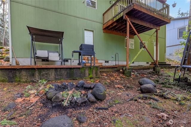 22222 Bluewater Dr SE, Yelm, WA 98597 - rear view of property with a wooden deck and crawl space