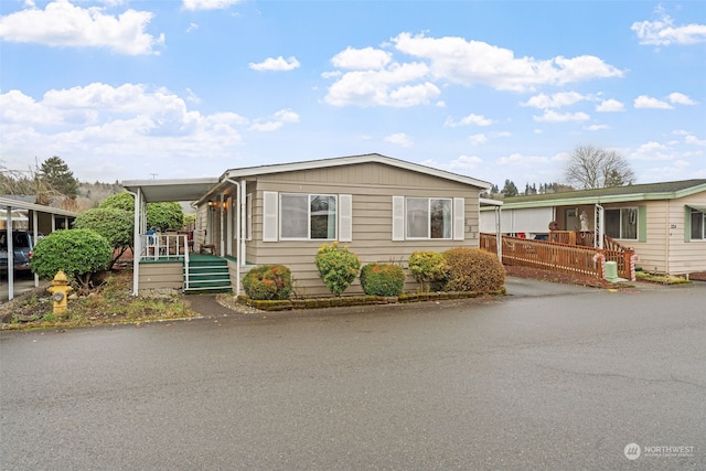 manufactured / mobile home with a porch