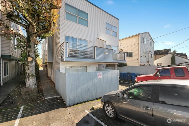 10335 Midvale Ave N, Seattle, WA 98133 - view of property with fence and uncovered parking