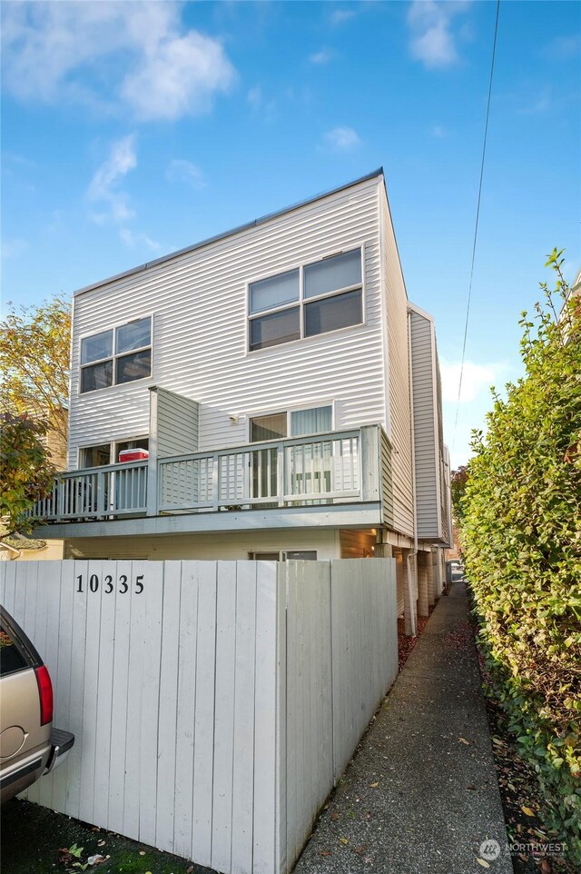 10335 Midvale Ave N, Seattle, WA 98133 - back of house featuring a balcony