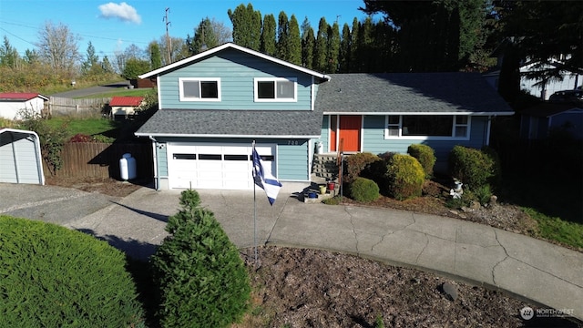 split level home with a garage