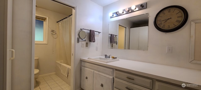 full bathroom featuring tile patterned floors, vanity, shower / bath combination with curtain, and toilet