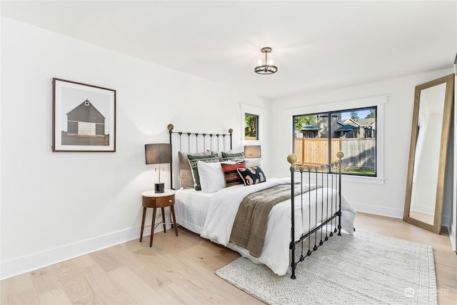 bedroom with light wood-type flooring