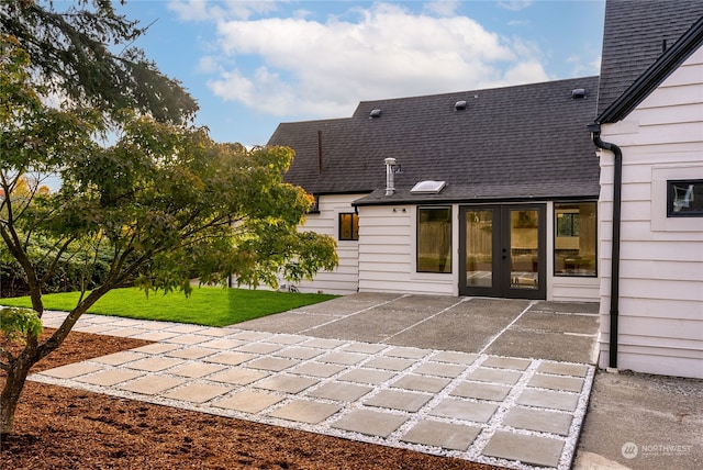 back of house featuring a patio and french doors