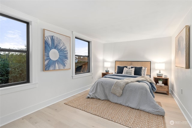 bedroom featuring light hardwood / wood-style floors