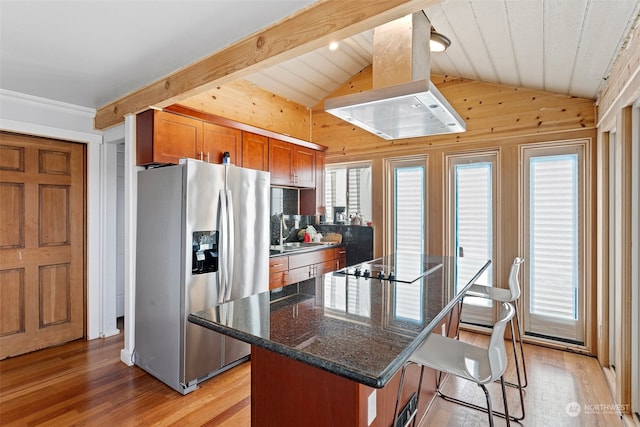 kitchen with a center island, vaulted ceiling with beams, stainless steel fridge with ice dispenser, light hardwood / wood-style flooring, and island exhaust hood