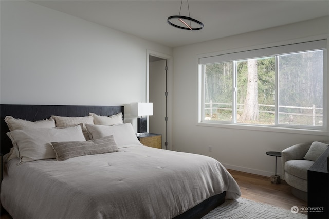 bedroom featuring hardwood / wood-style flooring