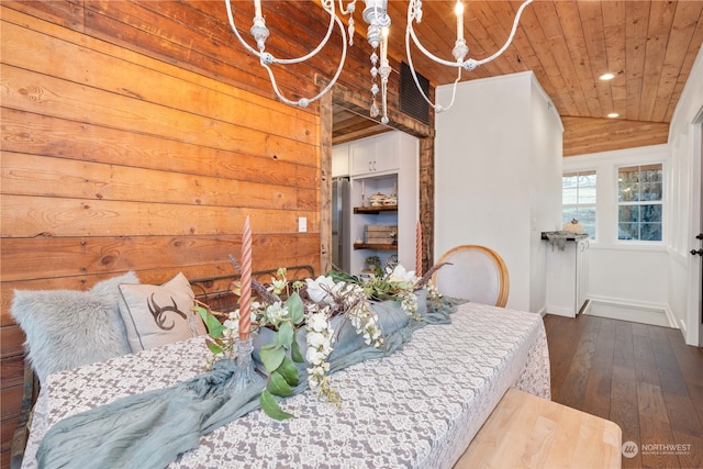 bedroom with vaulted ceiling, wooden ceiling, and dark hardwood / wood-style floors