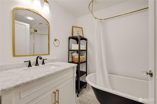384 Washington St, Manson, WA 98831 - bathroom featuring vanity, tile patterned flooring, and a combined bath / shower with freestanding tub