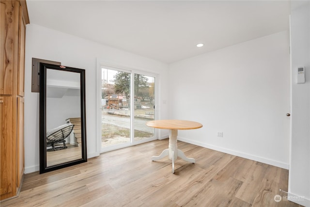 384 Washington St, Manson, WA 98831 - unfurnished dining area featuring light wood finished floors, baseboards, and recessed lighting