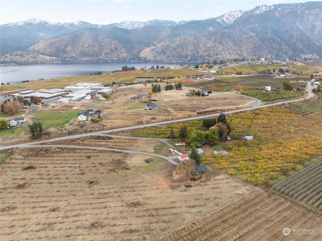 bird's eye view featuring a water and mountain view and a rural view