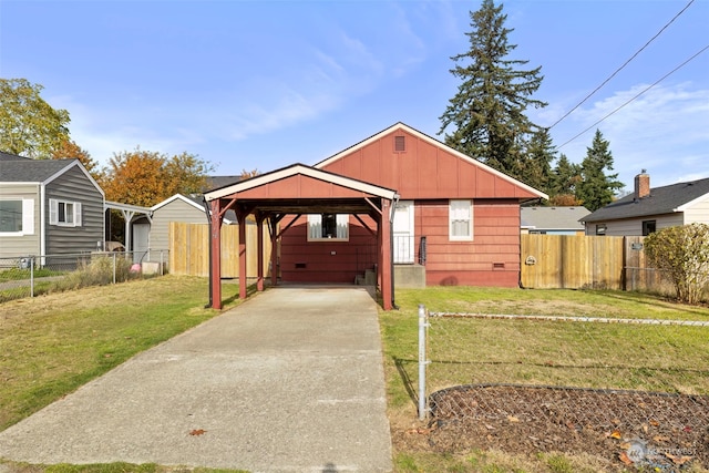 bungalow-style house with a front lawn