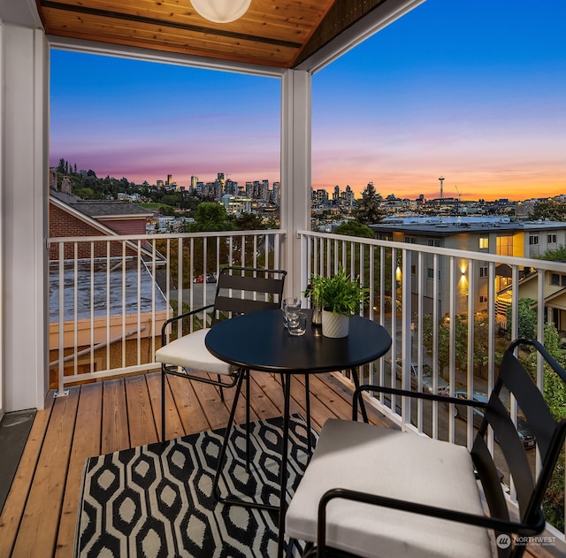 view of balcony at dusk