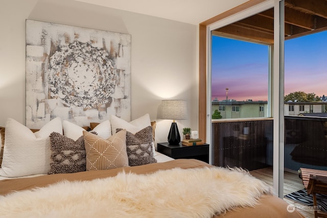 bedroom with floor to ceiling windows