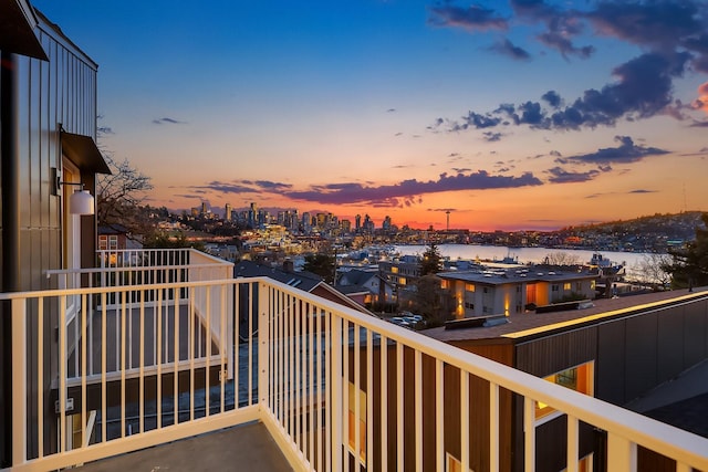 view of balcony at dusk