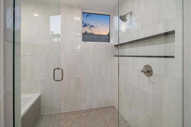 bathroom featuring an enclosed shower