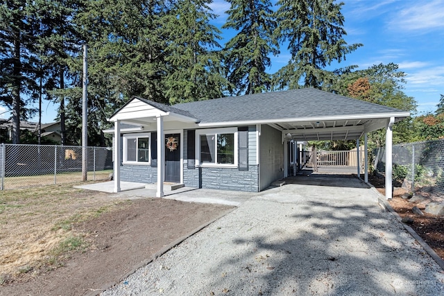 view of front of house featuring a carport