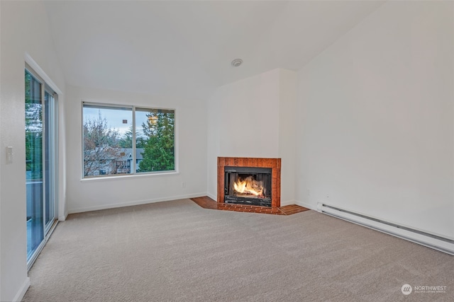 unfurnished living room with vaulted ceiling, baseboard heating, and light colored carpet