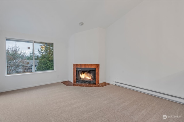 unfurnished living room with a baseboard radiator, lofted ceiling, and carpet floors