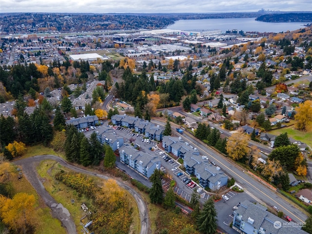 birds eye view of property with a water view