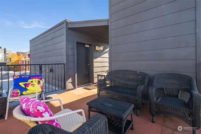 view of patio / terrace with a balcony