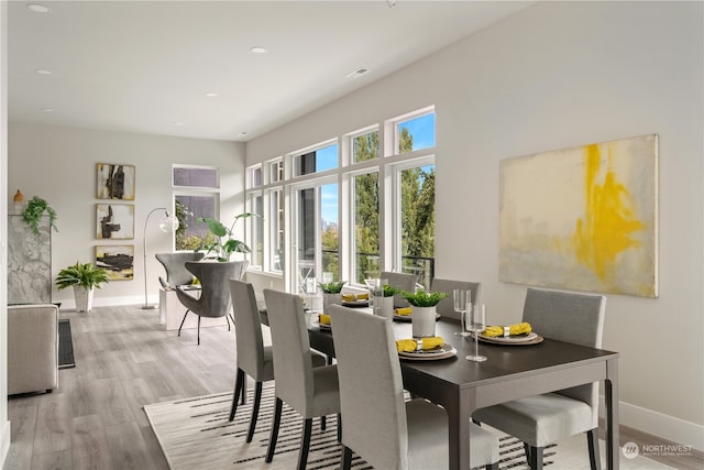 dining area with light wood-type flooring