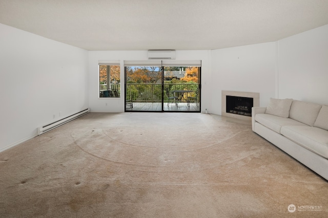 unfurnished living room with baseboard heating, a wall mounted AC, and light carpet