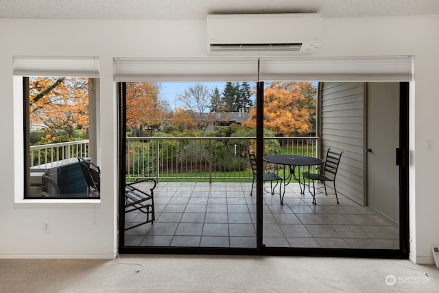 entryway with carpet, a textured ceiling, and a wall unit AC