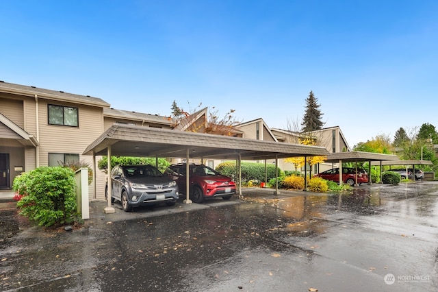 view of parking / parking lot featuring a carport